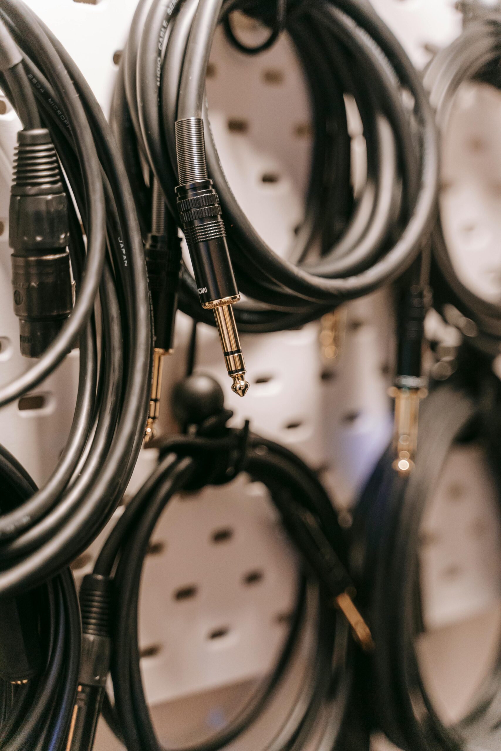 Audio cables hanging on display with 6.3mm jack connectors
